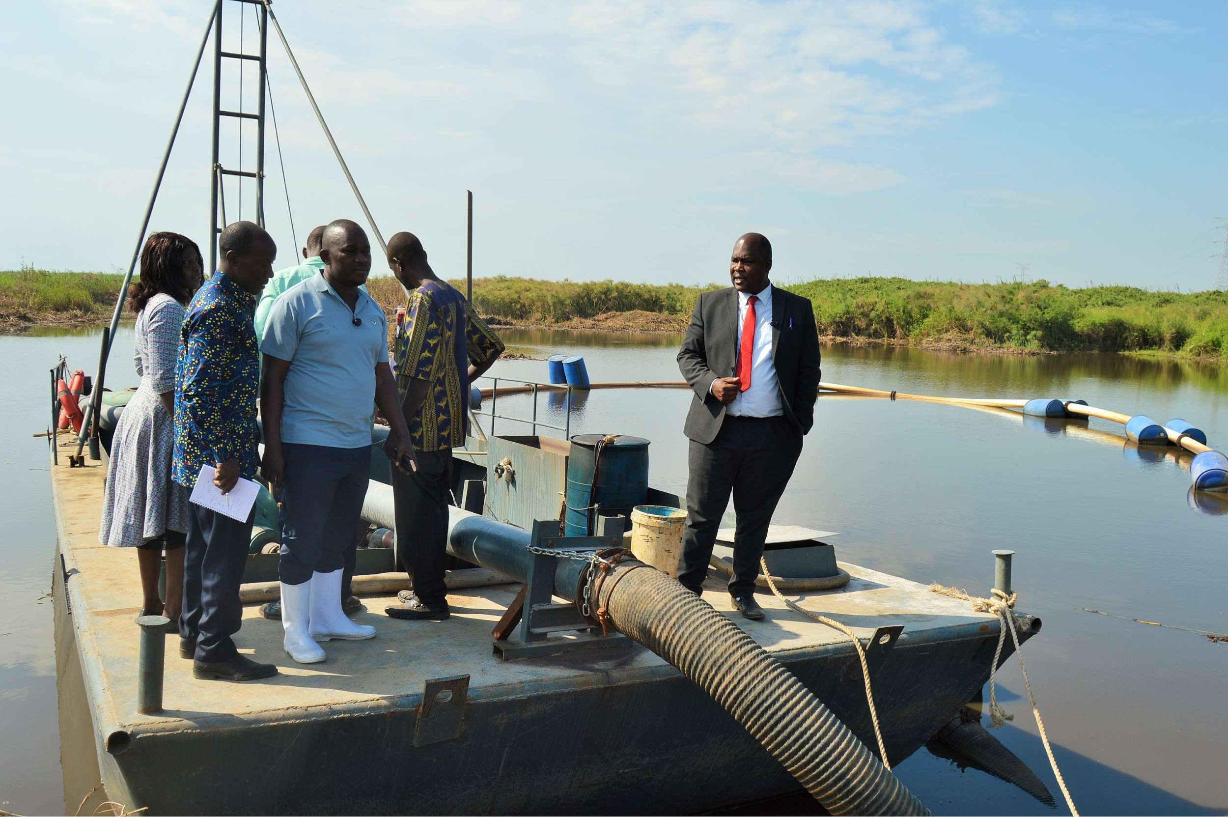 District Chairperson-Mr Kawuki Peter together with the NRM Chairperson-Mr Kaweesi Sulaiman visiting sand mines in Lwera