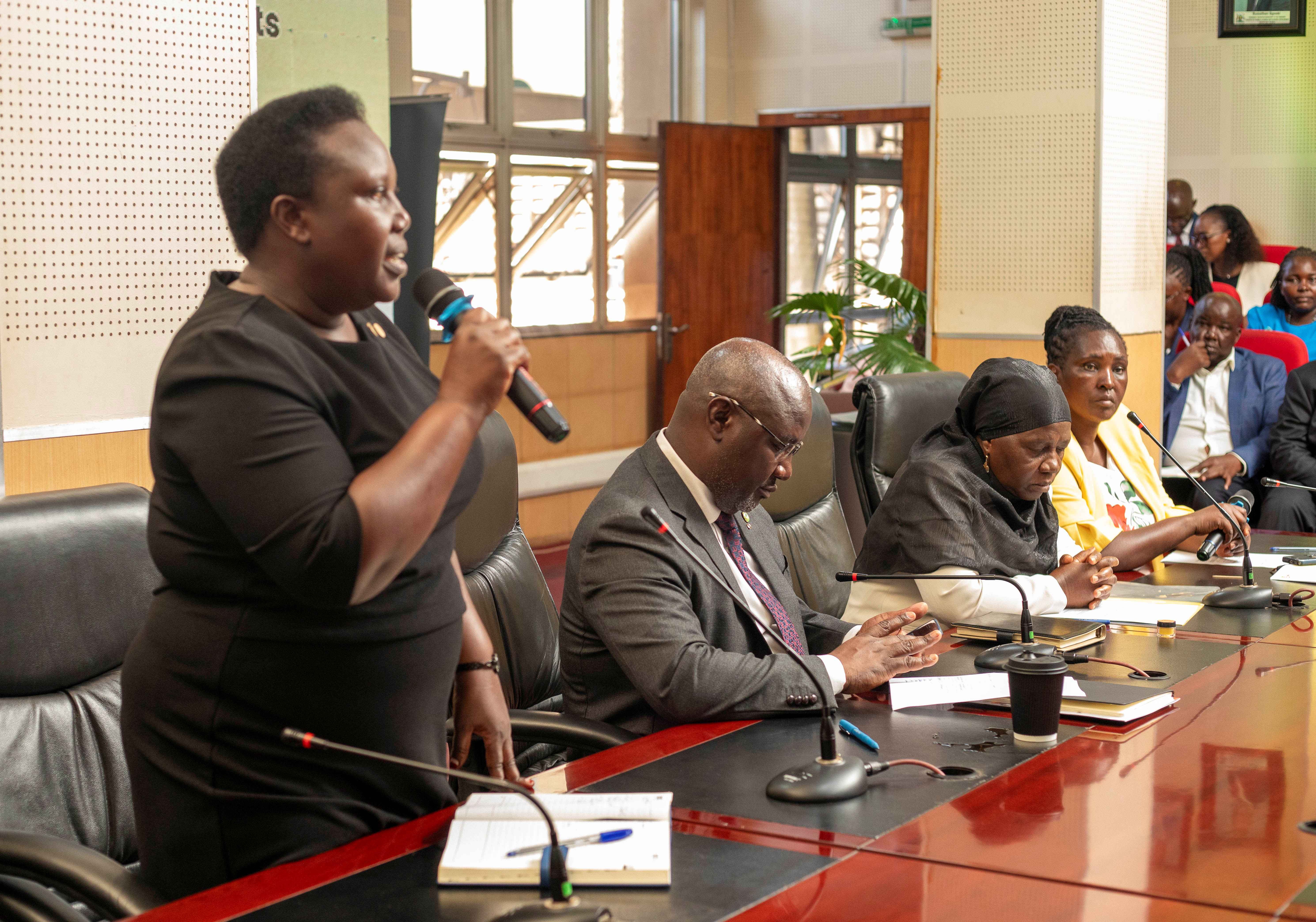 CAO-Ms Edith Namayega addresses meeting during launch of APA III at MoFPED Headquarters