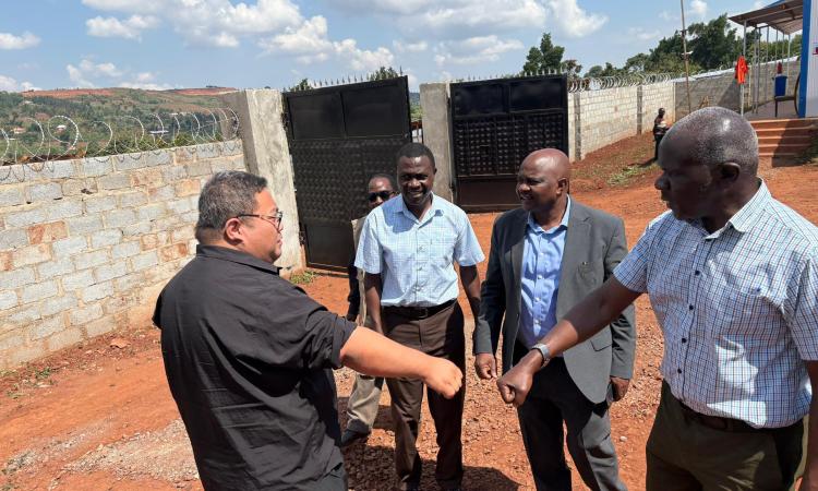 Program Coordinator GKMA-UDP Eng. George Bwanga leads PTC in monitoring progress of Mpigi–Muduuma road works