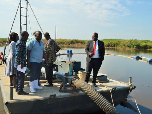 District Chairperson-Hon Kawuki Simon Peter together with the NRM Chairperson-Mr Kaweesi Sulaiman visiting sand mines in Lwera